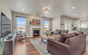 Living room featuring light hardwood / wood-style floors and a fireplace