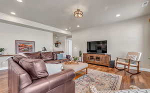 Living room with light wood-type flooring