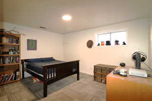 View of carpeted bedroom