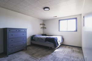 Bedroom featuring carpet