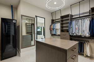 Spacious closet with a chandelier