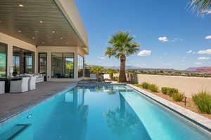 View of pool featuring a mountain view