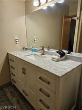 Bathroom with wood-type flooring and vanity