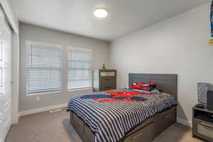 Bedroom #2 with carpet and a closet