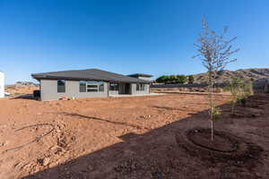 Rear view of house with a mountain view