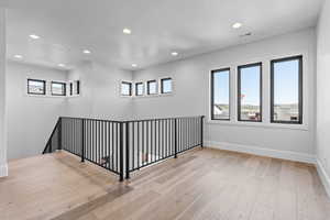 Spare room featuring light hardwood / wood-style flooring