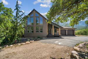 View of front of home featuring a garage