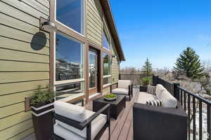 Wooden deck with an outdoor hangout area