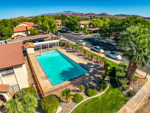 View of swimming pool featuring a mountain view and a patio area