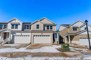 View of front of property with a garage