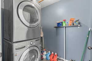 Washroom with stacked washer and dryer