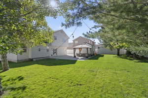 View of yard featuring a gazebo and a patio area