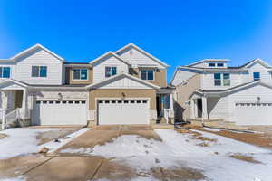 View of front of home featuring a garage