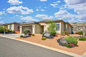 View of front of home with a garage