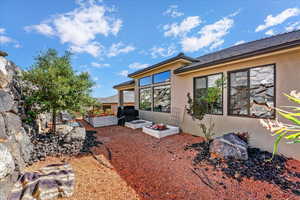 Exterior space featuring a patio area