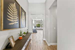 Hallway featuring light hardwood / wood-style flooring