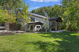 Back of house with lower level entrance