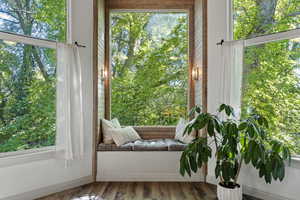 Upper Level: Master Bedroom window seat and creek view