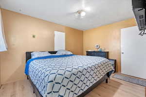 Bedroom with light wood-type flooring