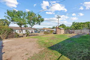 View of yard with a shed