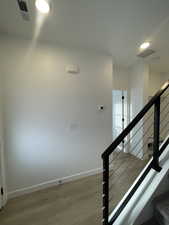 Stairs with wood-type flooring