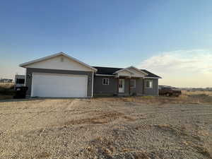 Ranch-style house with a garage