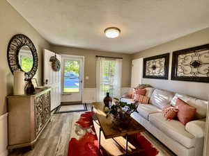 Formal living room with laminate flooring