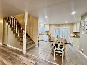 Dining space featuring french doors to exit to the covered patio / back yard