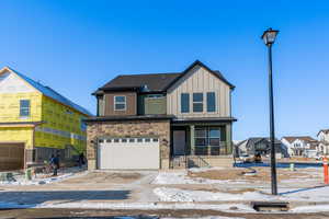 View of front of property with a garage