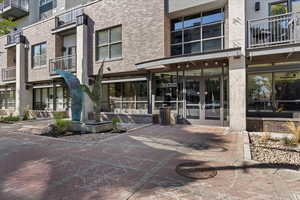 Entrance to property with a balcony