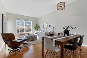 Dining space with wood-type flooring