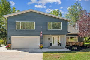 View of front of house with a garage