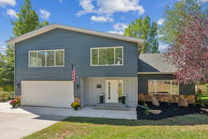 View of front of home featuring a garage