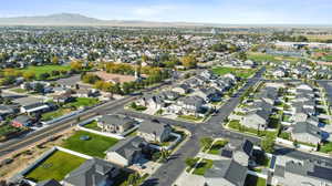 Birds eye view of property with a mountain view