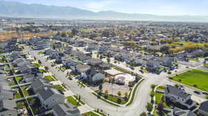 Birds eye view of property with a mountain view