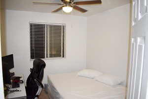 Bedroom featuring ceiling fan