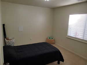 View of carpeted bedroom