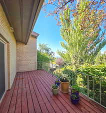 View of back deck off of level 1 kitchen / media room with a view of the Valley