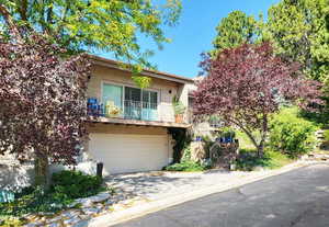 Front of Property with 2 car garage and driveway