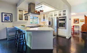 Kitchen with White cabinets and white Carrara marble counters