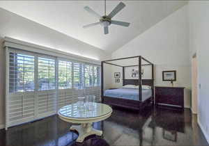 Primary Bedroom with high vaulted ceiling, ceiling fan, and dark hardwood / wood floors. With view to the East deck and pool.