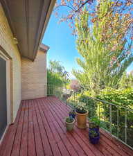 View of back deck off of level 1 kitchen / media room with a view of the Valley