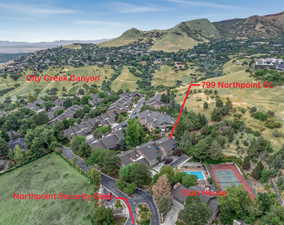 Aerial view of community with a mountain view