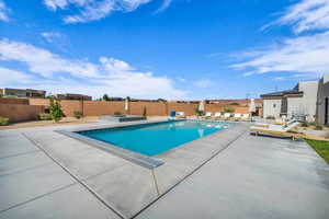 View of swimming pool with a patio