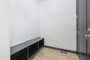 Mudroom featuring light wood-type flooring