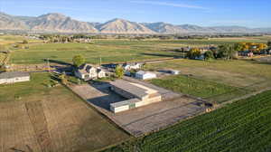 Drone / aerial view featuring a mountain view and a rural view