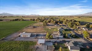 Drone / aerial view featuring a rural view and a mountain view