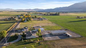 Drone / aerial view featuring a mountain view and a rural view