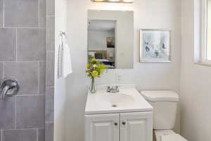 Bathroom with vanity and toilet