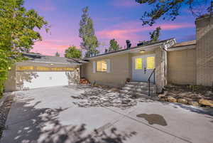 View of front of home with a garage